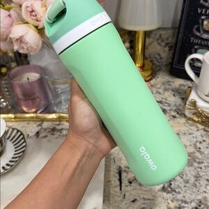 Owala Green and Pink Water Bottles